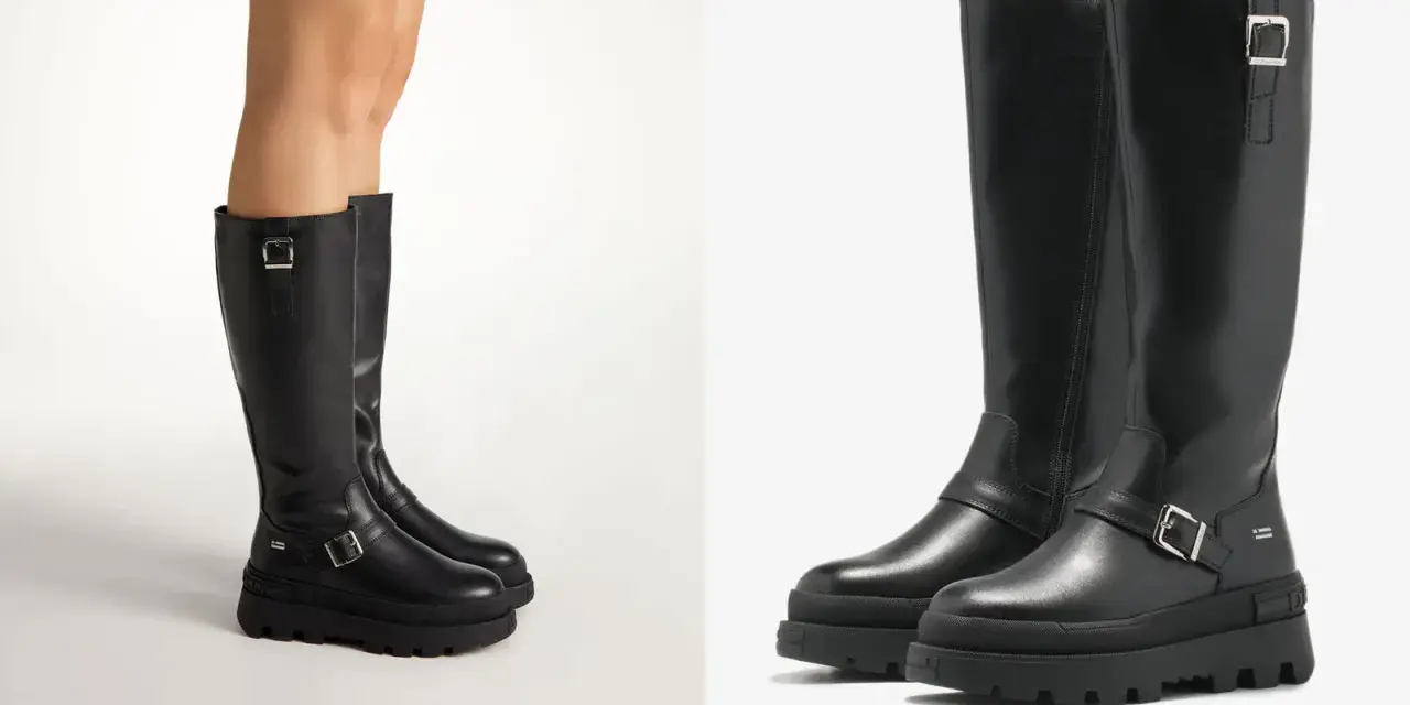 Botas negras de altura de caña con hebillas y suela gruesa.