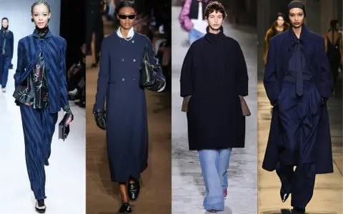 Modelos desfilan con elegantes trajes azul marino, mostrando cómo combinar traje azul marino mujer con estilo y sofisticación.