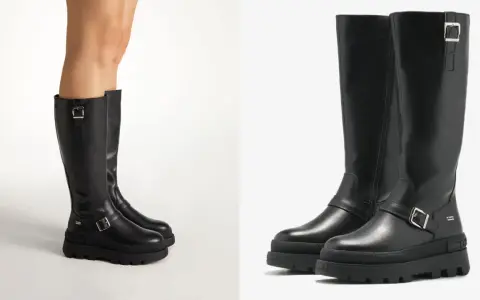 Botas negras de altura de caña con hebillas y suela gruesa.