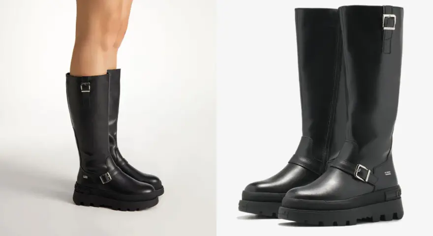 Botas negras de altura de caña con hebillas y suela gruesa.